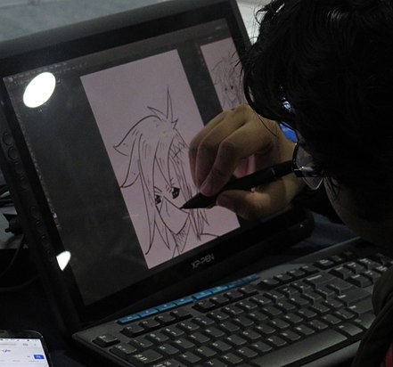 Attendee sketching on a drawing tablet. Image: Agastya.
