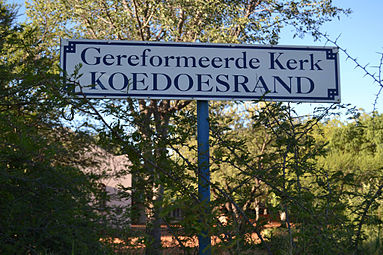 Gereformeerde kerk Koedoesrand, naambord, Rudi van Wyk.jpg