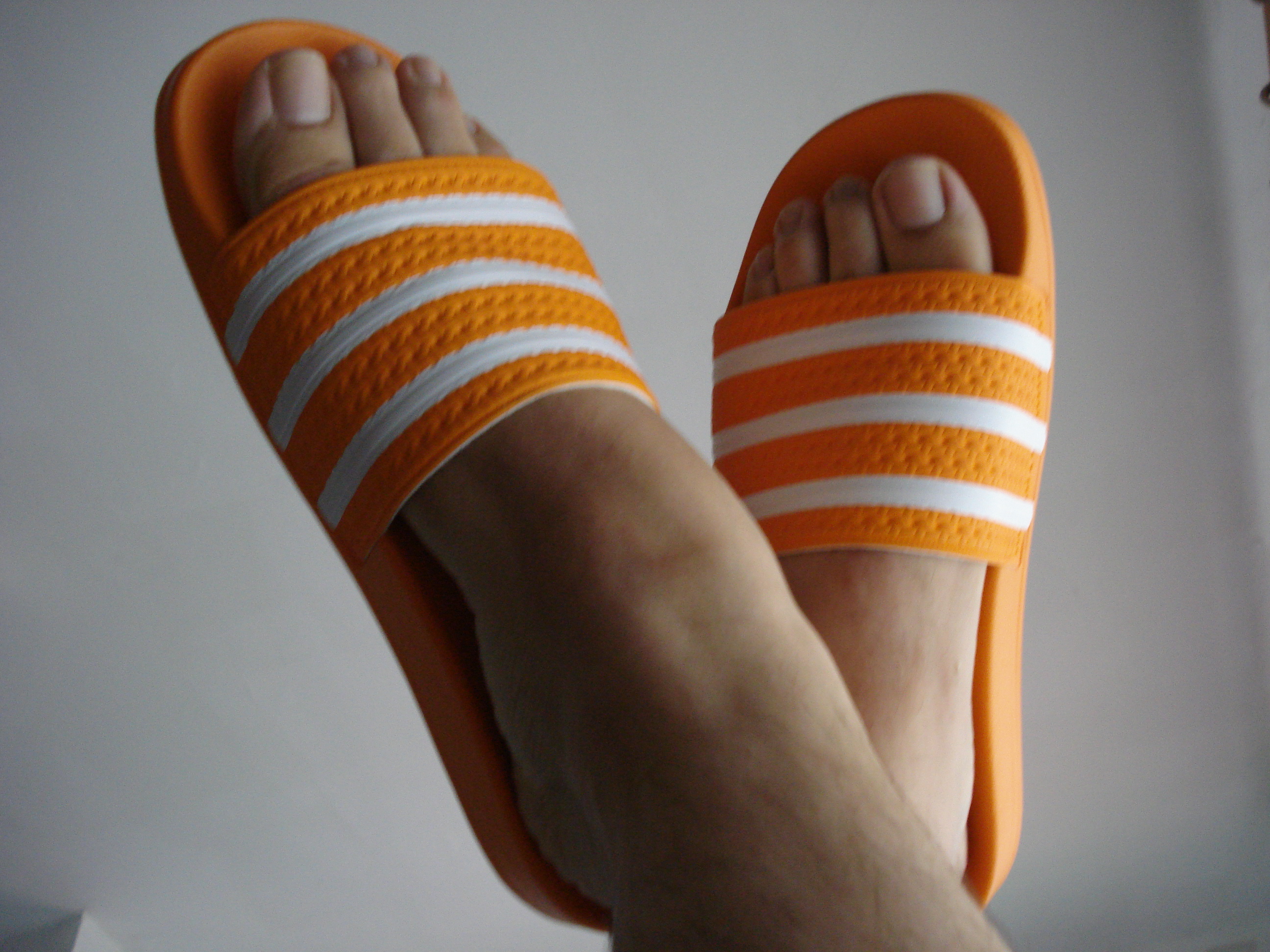 adilette slides orange