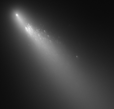Material coming off Component B of 73P/Schwassmann–Wachmann, which broke up starting in 1995, as seen by the Hubble Space Telescope.