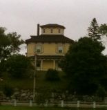 A "widow's watch" on a home in Saint John, New Brunswick, Canada. Unlike examples in warmer climates, this one is enclosed.