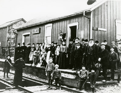 Crowd gathered in front of the Blair Grand Trunk Railway station in 1898