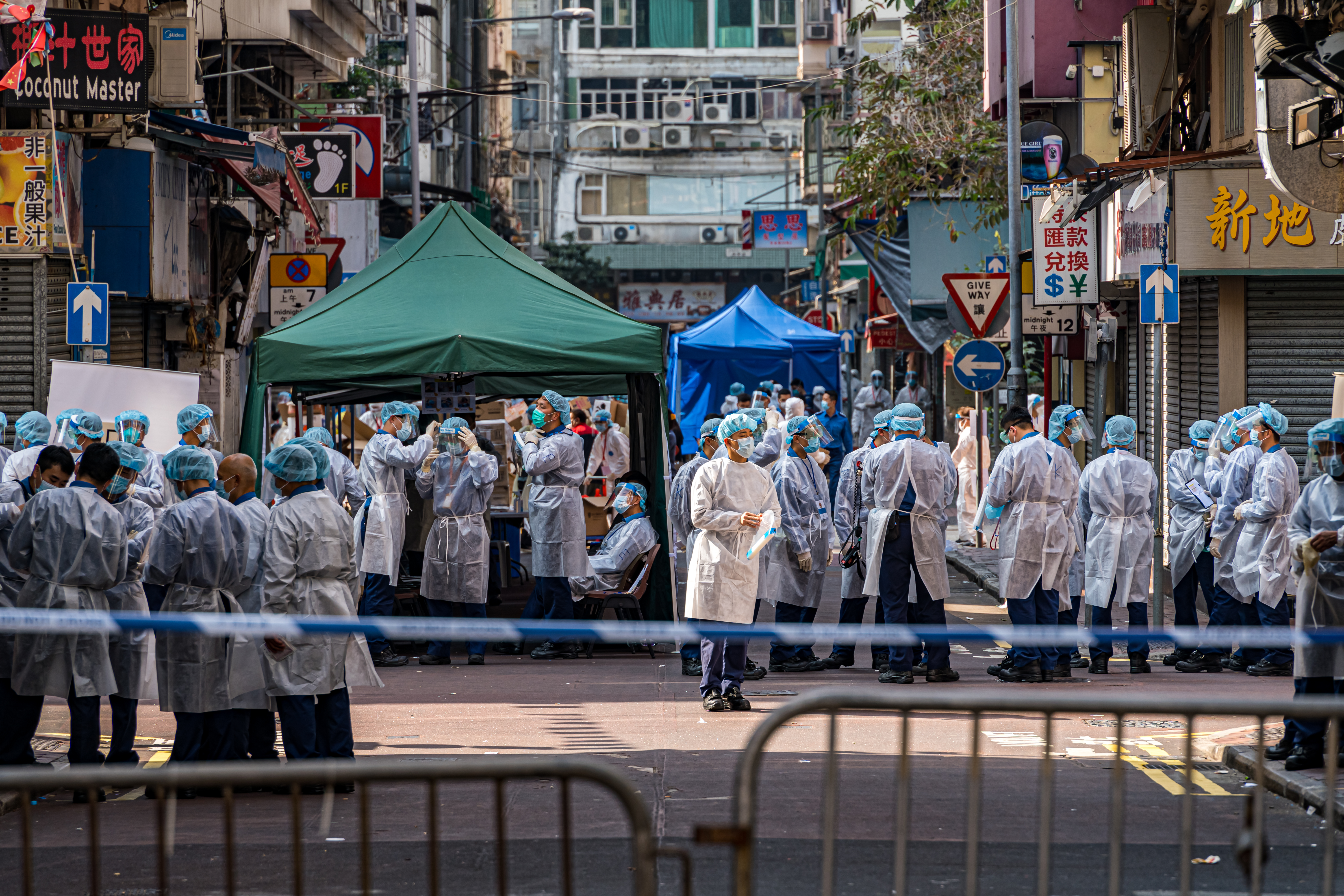 Hong Kong, China. 23rd Sep, 2021. Pedestrians walk past the