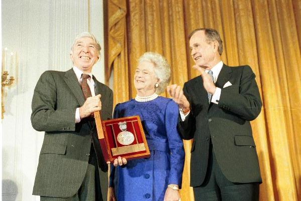 File:John Updike with Bushes.jpg