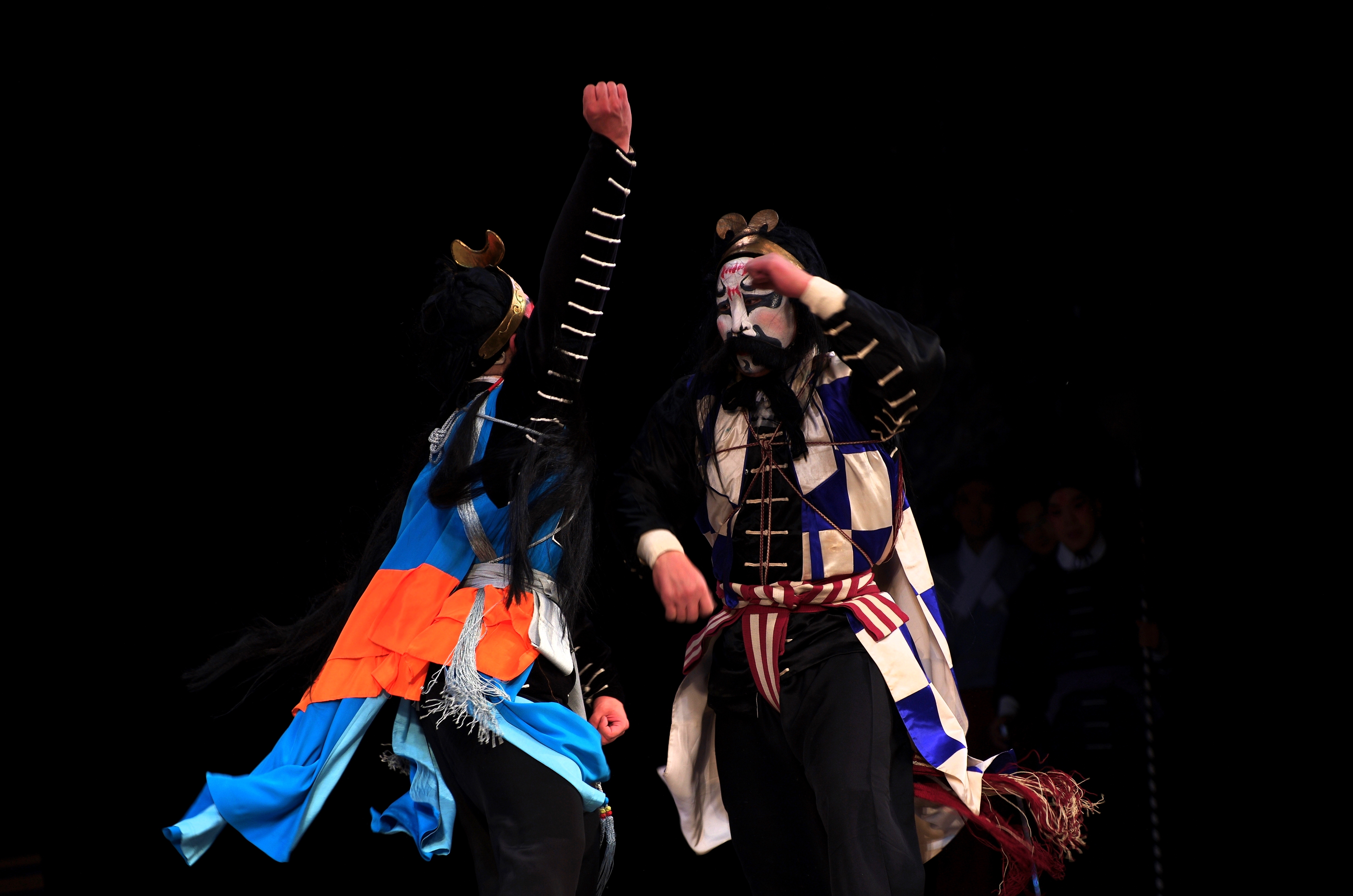 Wu Song (left) fights the "Flying Centipede", from a 2014 [[Peking opera