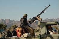 A Tuareg rebel fighter in northern Niger during the Second Tuareg Rebellion, 2008 Nigerien MNJ fighter technical gun.JPG