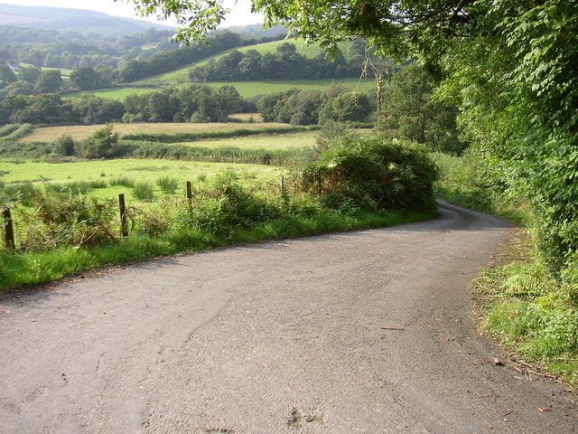 File:Road leading downhill, by Rhiwrhwch Isaf - geograph.org.uk - 946031.jpg