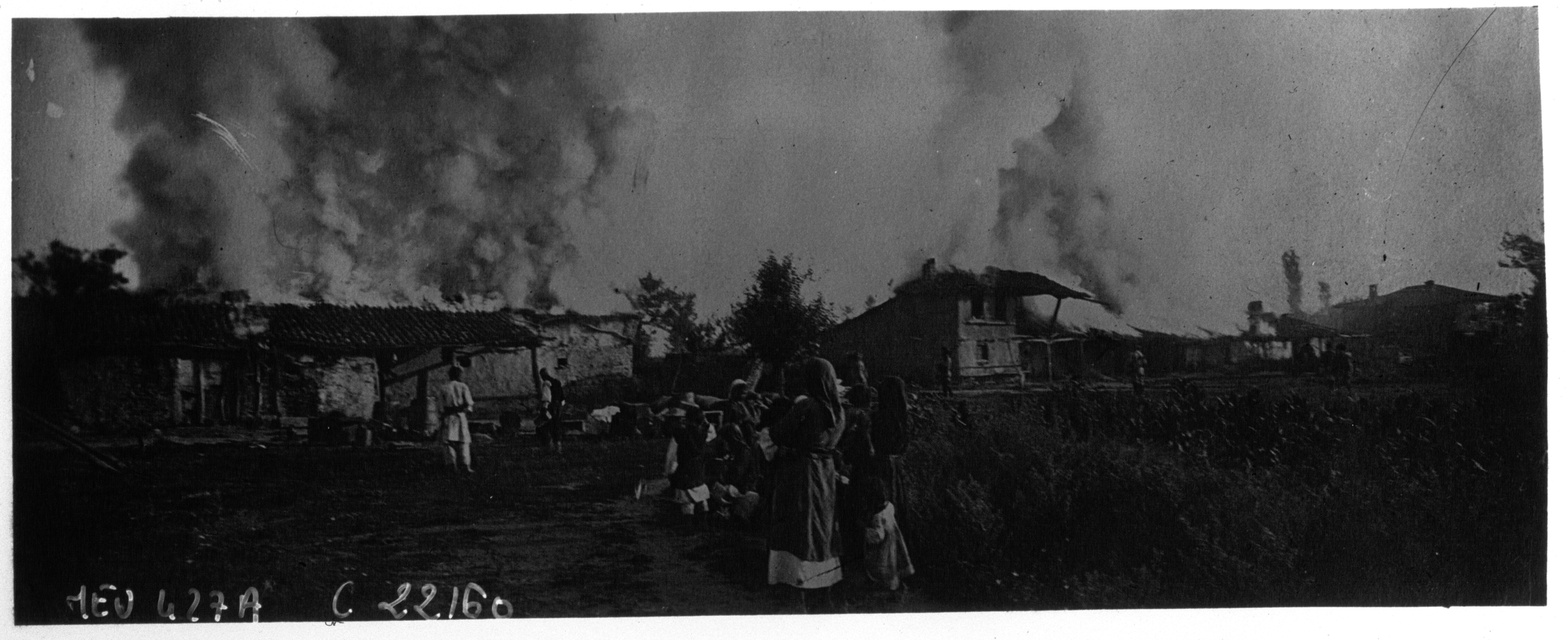 https://upload.wikimedia.org/wikipedia/commons/0/04/Turkish_village_burned_down.jpg