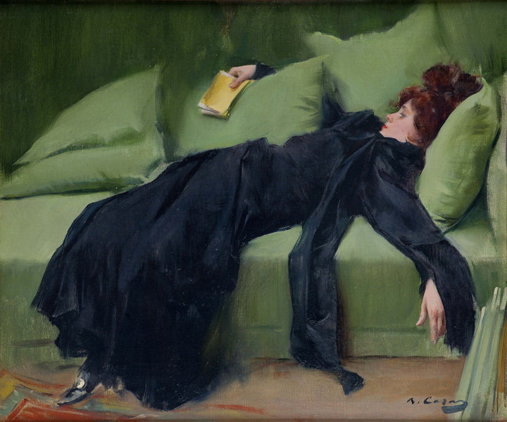 A painting of a woman dressed head to toe in flowing blue-black, collapsed on a green sofa piled with cushions. She is looking at the closed yellow book in her right hand. Her left hand dangles off the side of the sofa.