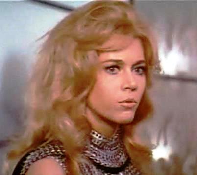In Roger Vadim's 1968 film Barbarella, Jane Fonda as the title character did a striptease in zero-gravity out of her spacesuit.  Fonda continually changed outfits in the film, most of which were skin-tight and designed for their erotic appeal.
