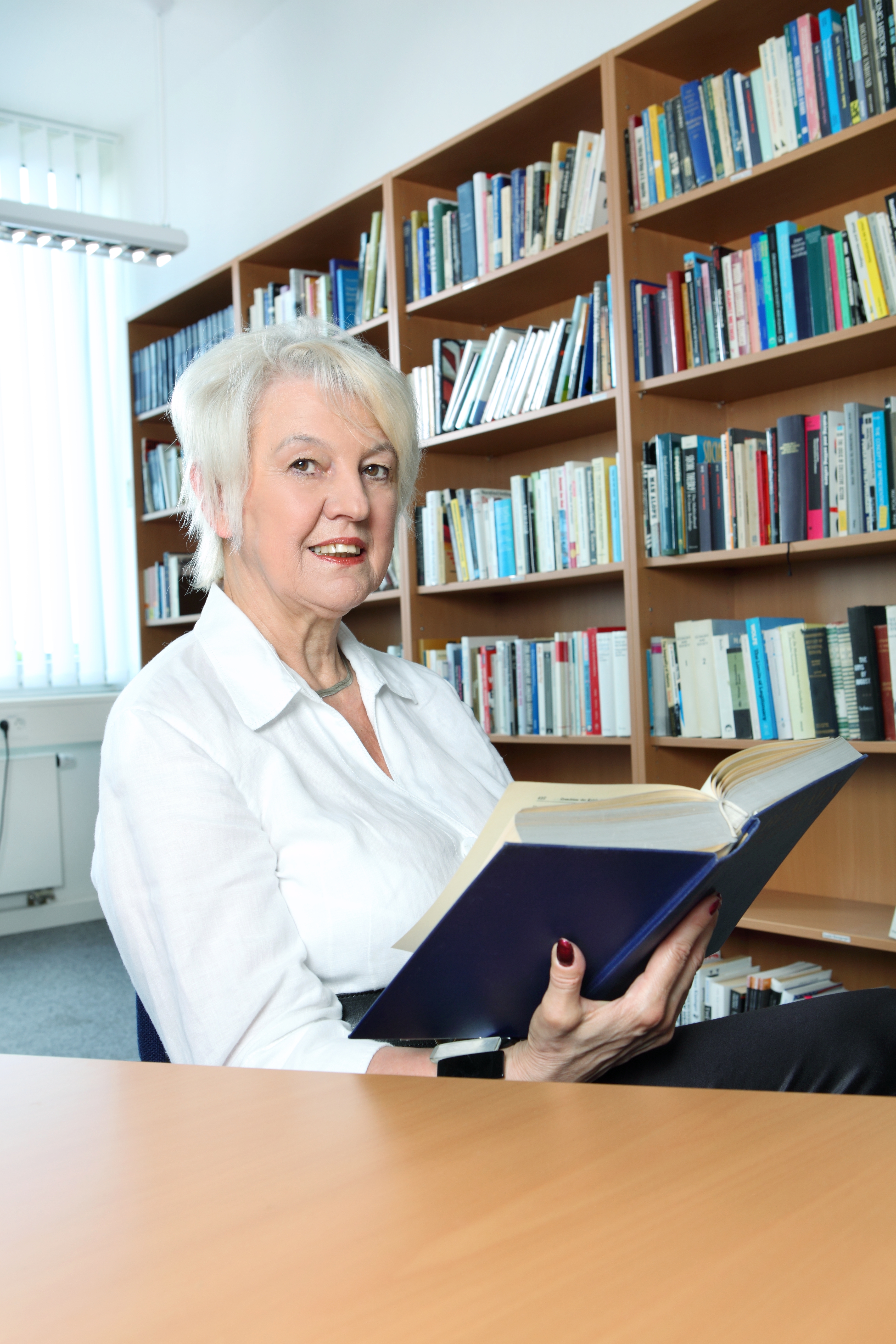 Brigitte Young in her office