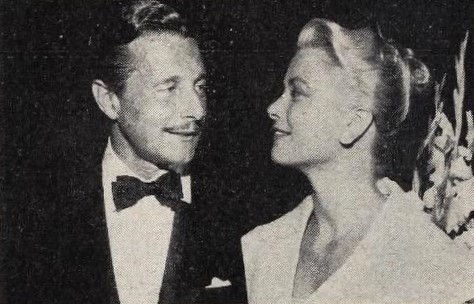 Grace Kelly and Oleg Cassini only have eyes for each other, 1954