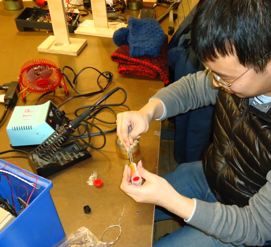 File Nyu Student Soldering Electronic Components Jpg Wikimedia