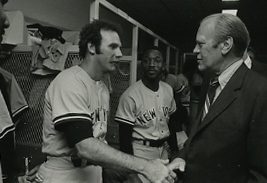 Lyle (left) shaking hands with Gerald Ford in 1976