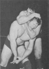 Adonis applying a chokehold to Bob Backlund during a 1982 match
