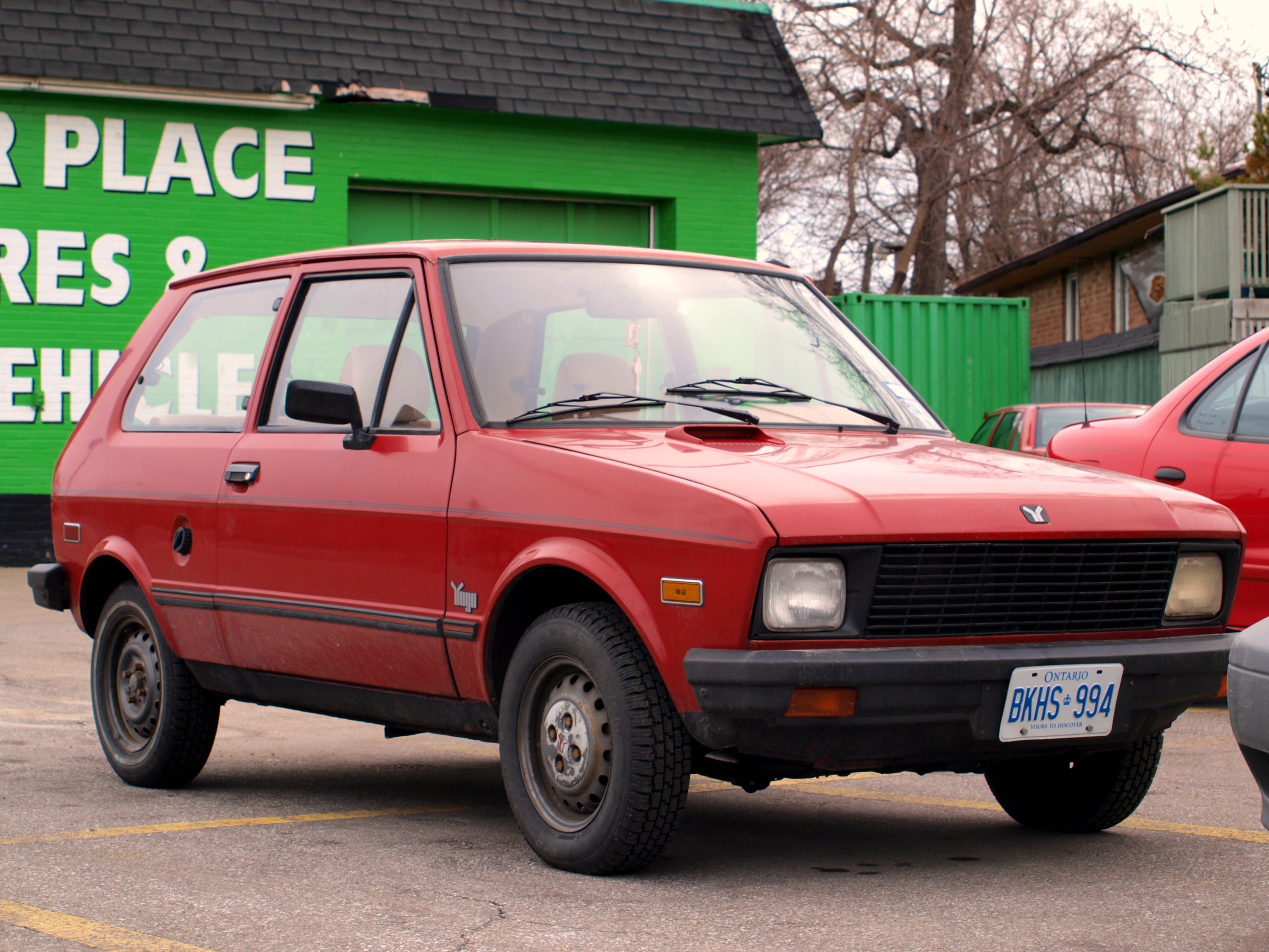 Red_Yugo_GV_in_Junction_Triangle,_Toront