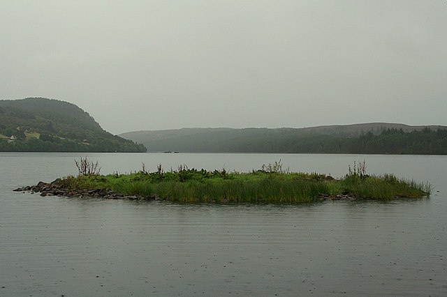 File:The crannog on Loch Migdale during a shower. - geograph.org.uk - 557928.jpg