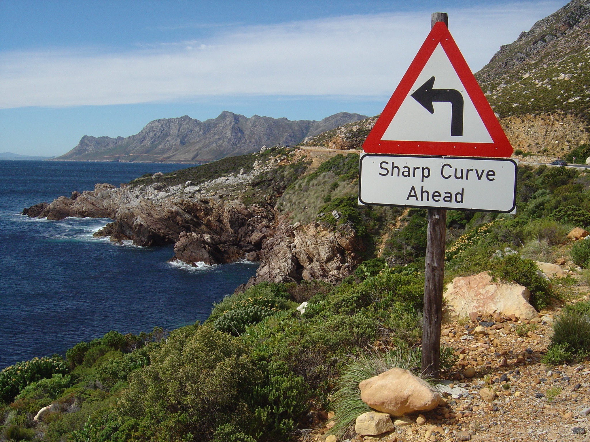 Почему false Bay. Road sign Sharp curve.