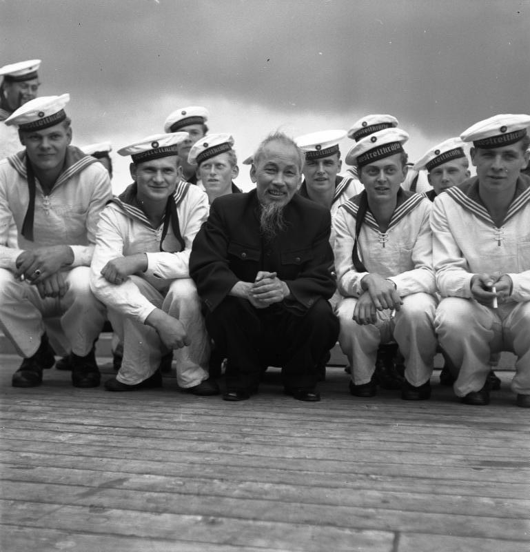 Ho Chi Minh from the Việt Minh independence movement and Việt Cộng with East German sailors