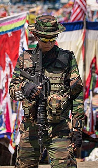 A Malaysian Army soldier armed with Colt M4 standing guard in Sabah east coast as part of the Eastern Sabah Security Command (ESSCOM). Semporna Sabah ESSCOM-soldiers-04 (extracted).jpg