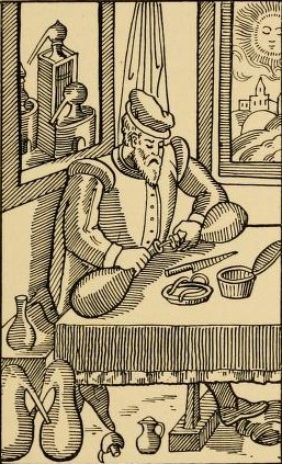 Alchemist fixing his apparatus, with luting box and knife on the table (engraving, 1576) Alchemist at work.jpg