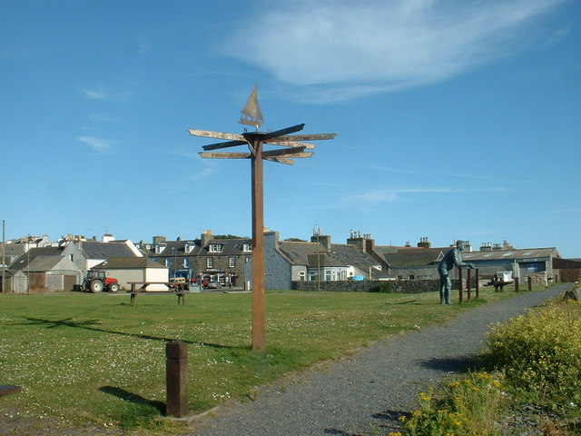 File:The Signpost and the Statue - geograph.org.uk - 214174.jpg