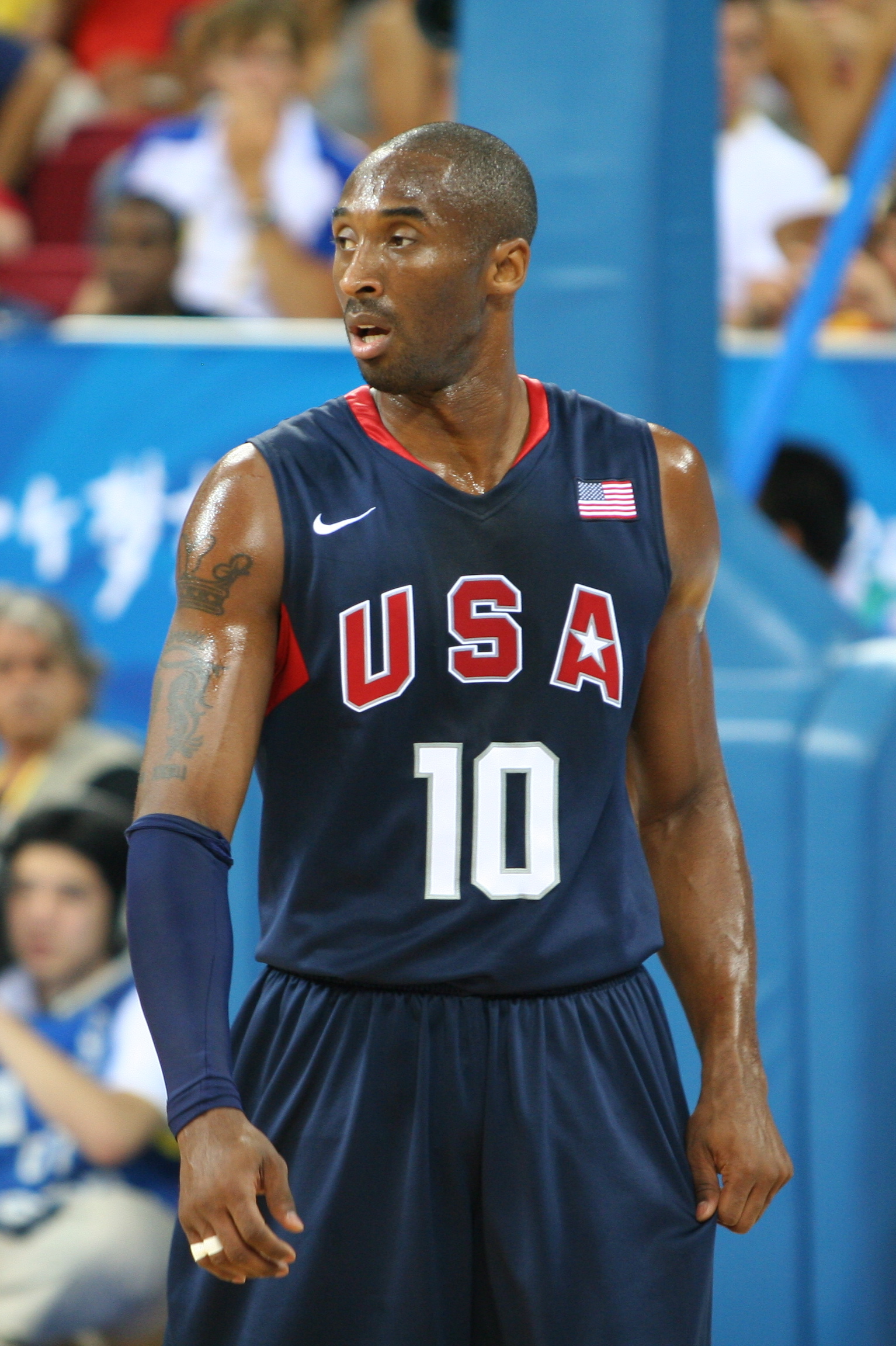 NBA player, Kobe Bryant watches the Olympic soccer match between Argentina  and Serbia at the Beijing Workers Stadium, Beijing Stock Photo - Alamy