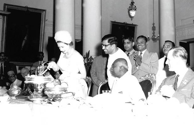 File:Narendra Modi's gifts to Her Majesty Queen Elizabeth II, of the United Kingdom, in London. The photograph shows February 19, 1961; Chennai. Her Majesty cutting a cake to celebrate the first birthday of Prince Andrew.jpg