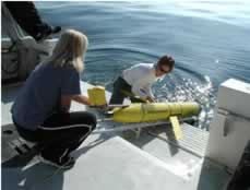 NOAA personnel launch a Slocum glider
