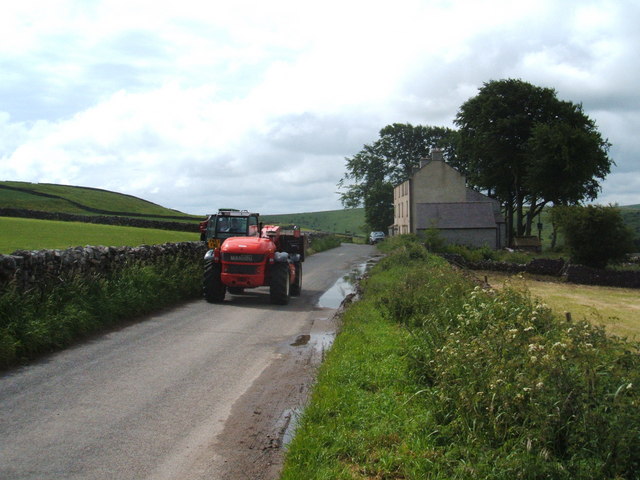 File:Tractors at New Houses - geograph.org.uk - 1365919.jpg