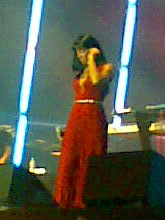 Rowland performing during the Ms. Kelly Tour in 2007 KRowlandWarsshaw.jpg