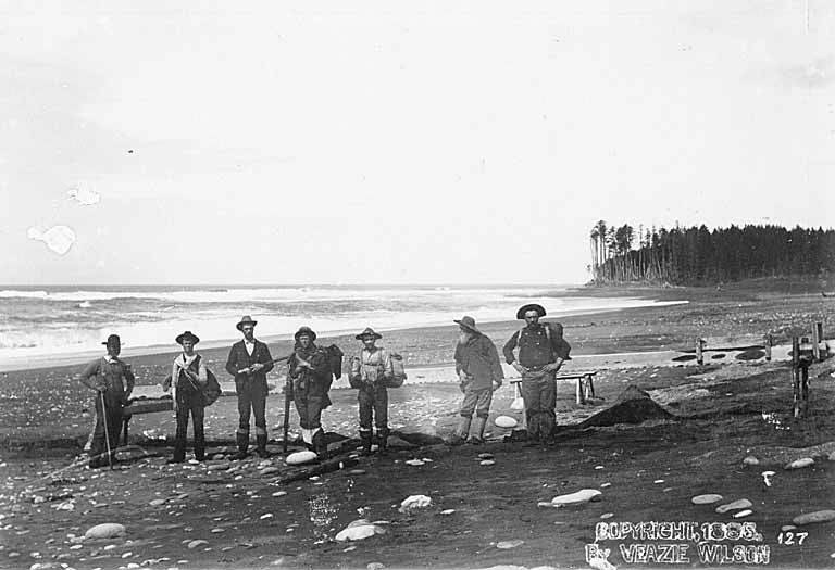 File:Group of miners on a unidentified beach carrying equipment and supplies, Alaska, 1895 (AL+CA 2652).jpg