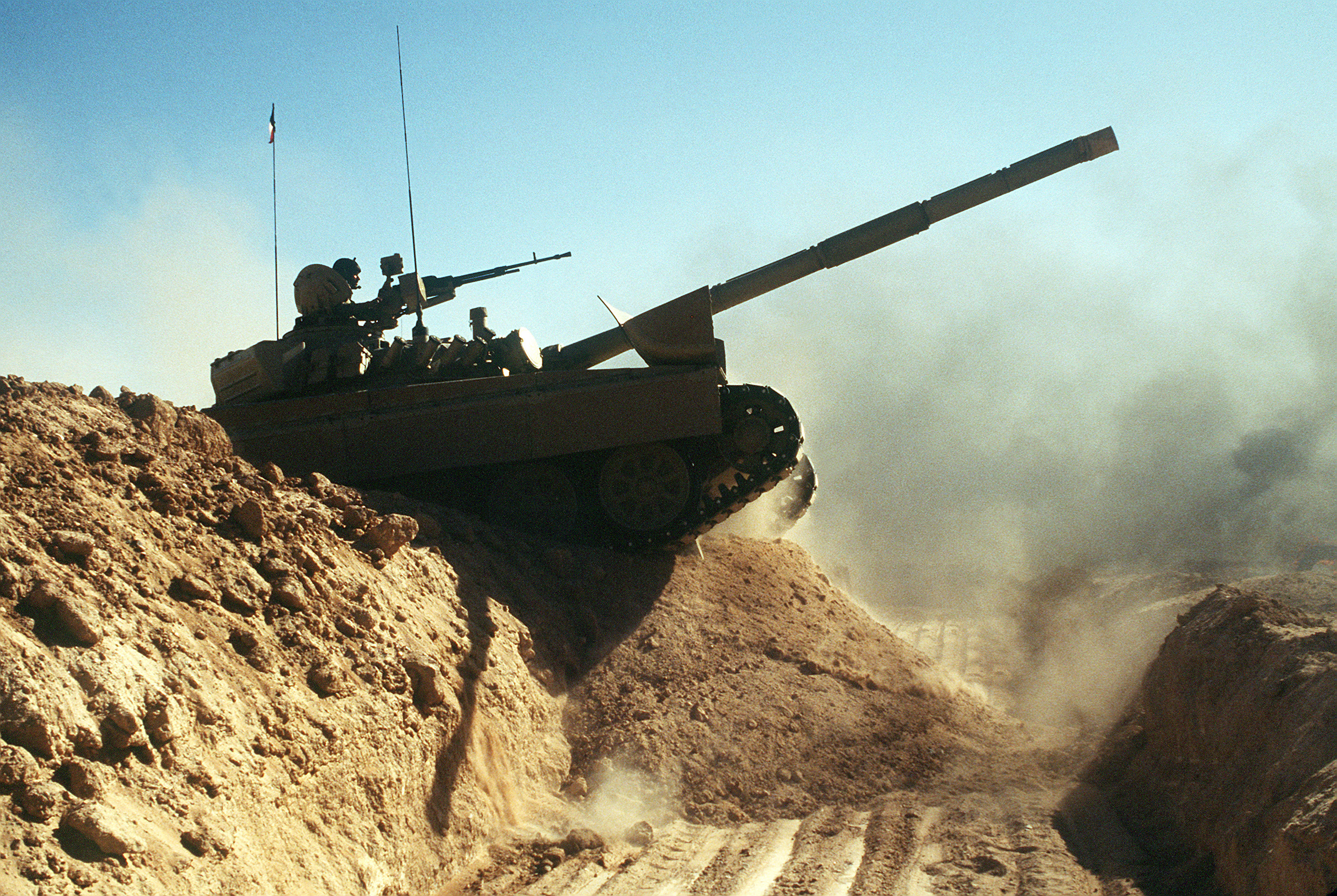 File:A Kuwaiti M-84AB tank crosses a trench during Operation