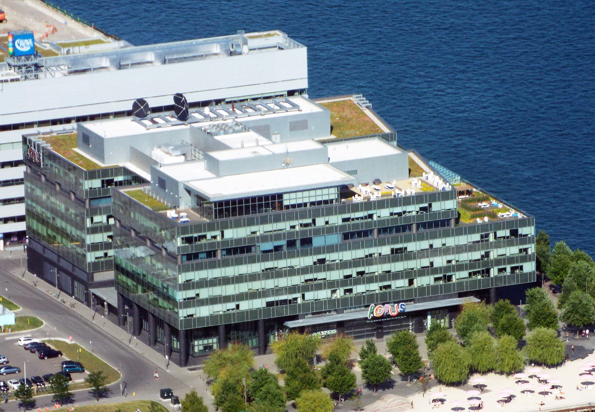 Corus's headquarters, [[Corus Quay]] in Toronto, as seen from the [[CN Tower]]