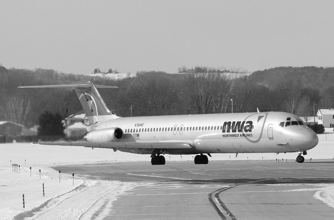 NWA DC-9 in black and white (380028573).jpg