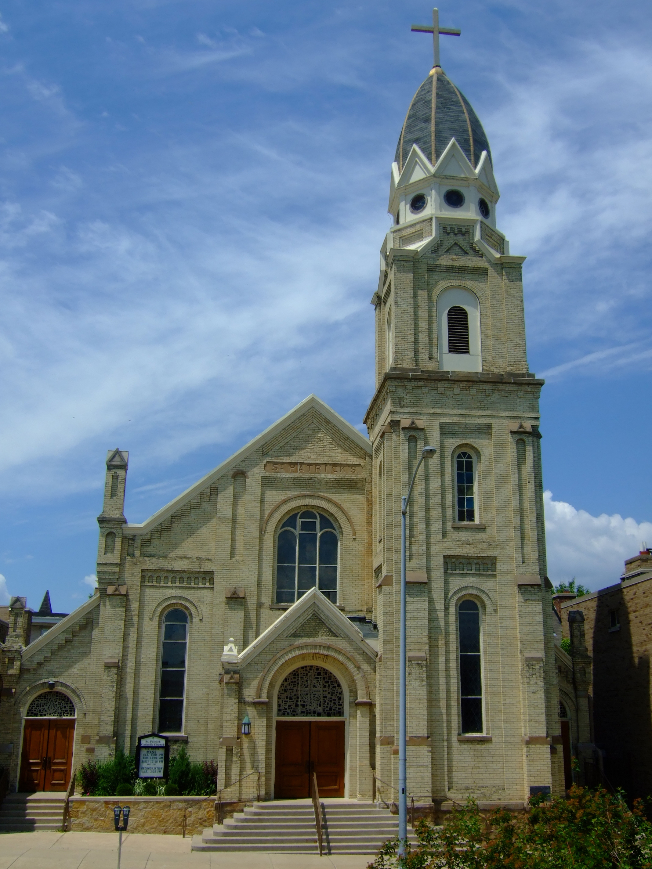 Can a Catholic parish have more than one church within it?