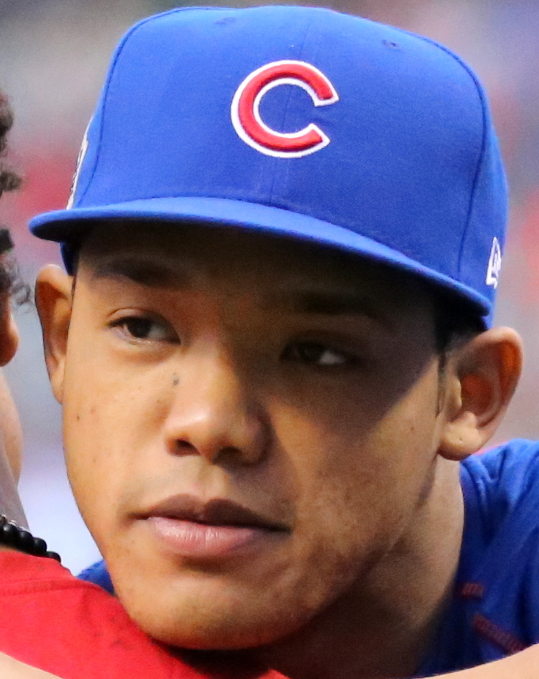 File:Francisco Lindor and Addison Russell hug it out before World Series  Game 6. (30632990581).jpg - Wikimedia Commons