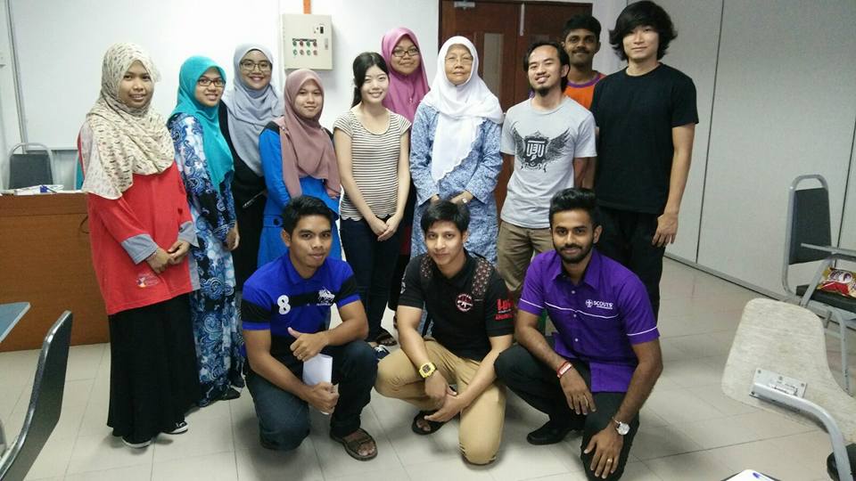 Moris (white scarf in the middle) in 2015 with her students at Universiti Sains Malaysia