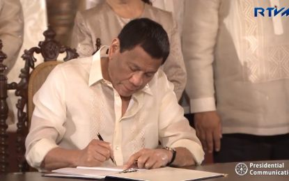 President Rodrigo Duterte signs the Philippine Space Act (RA 11363), August 2019