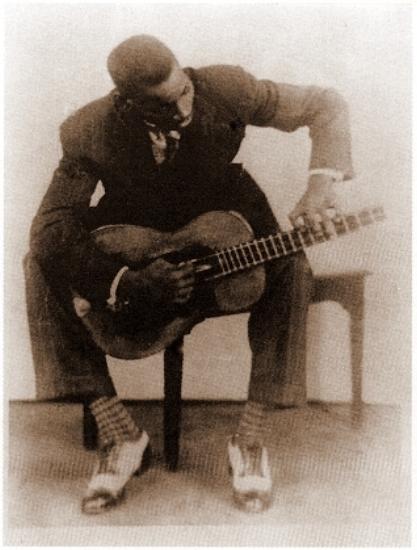Isaac Oviedo playing his tres, c. 1930.