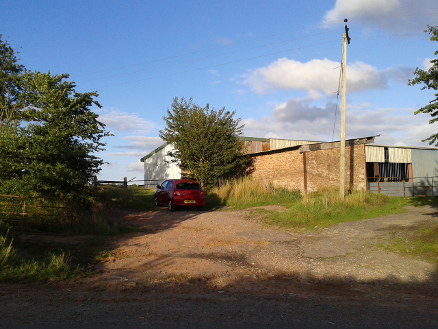 File:Farm buildings and a car - geograph.org.uk - 4651338.jpg