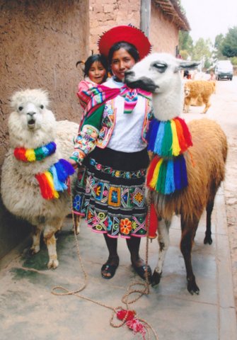 File:Mother and child with two alpacas in Peru.jpg