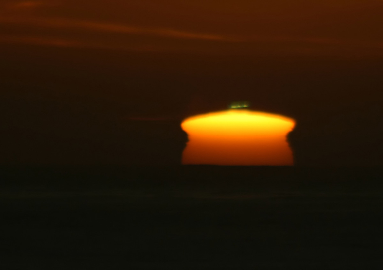 File:Sunset mirage and green flash 02-10-08.jpg