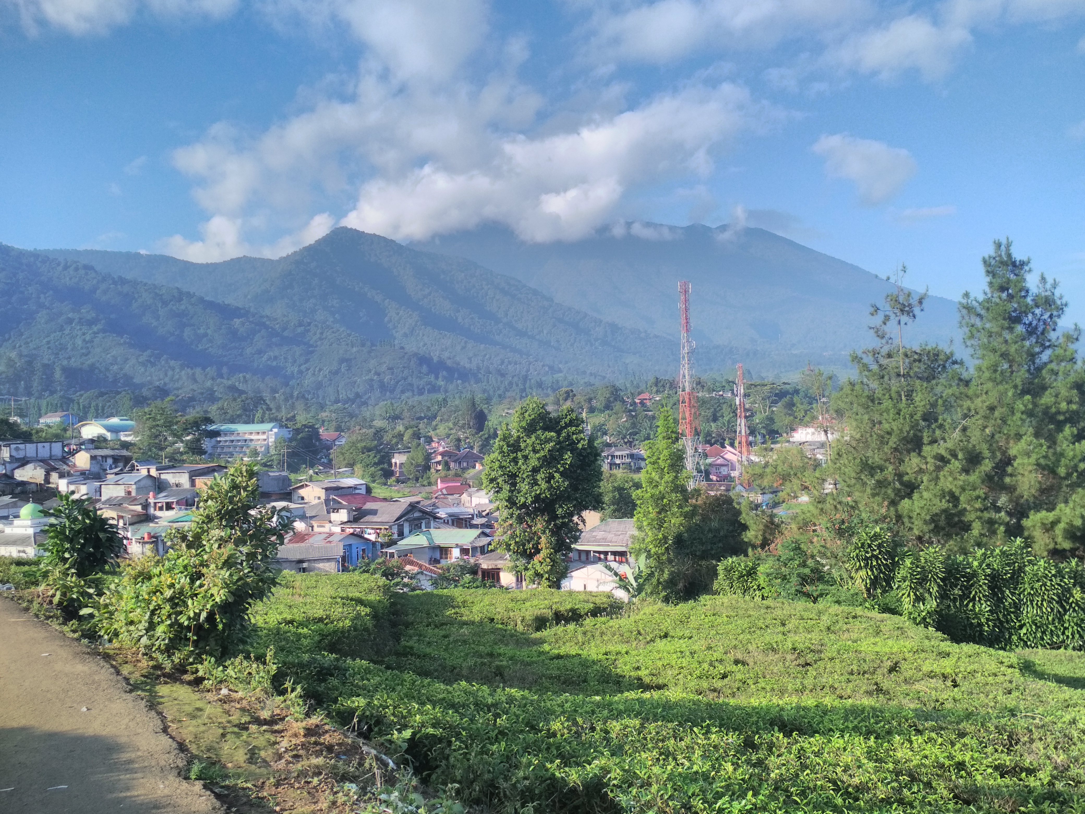 A Panoramic View of Gunung Gede, Bogor, and the houses of civilians that lived there