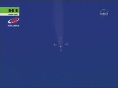 Here the four first stage boosters fall away, creating a cross smoke pattern in the sky, also known as a Korolev cross.