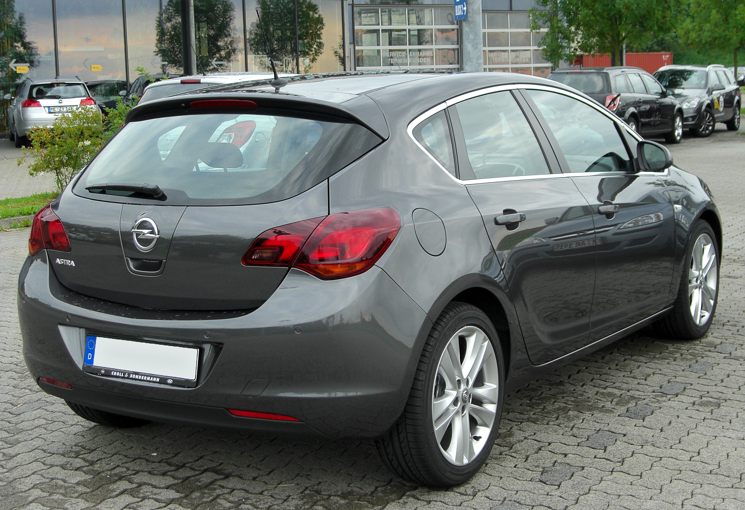 Opel Astra J Hatchback Photos and Specs. Photo: Opel Astra J