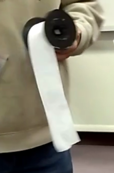 Roll of paper from direct-recording machine, with votes from numerous voters, Martinsburg, West Virginia, 2018