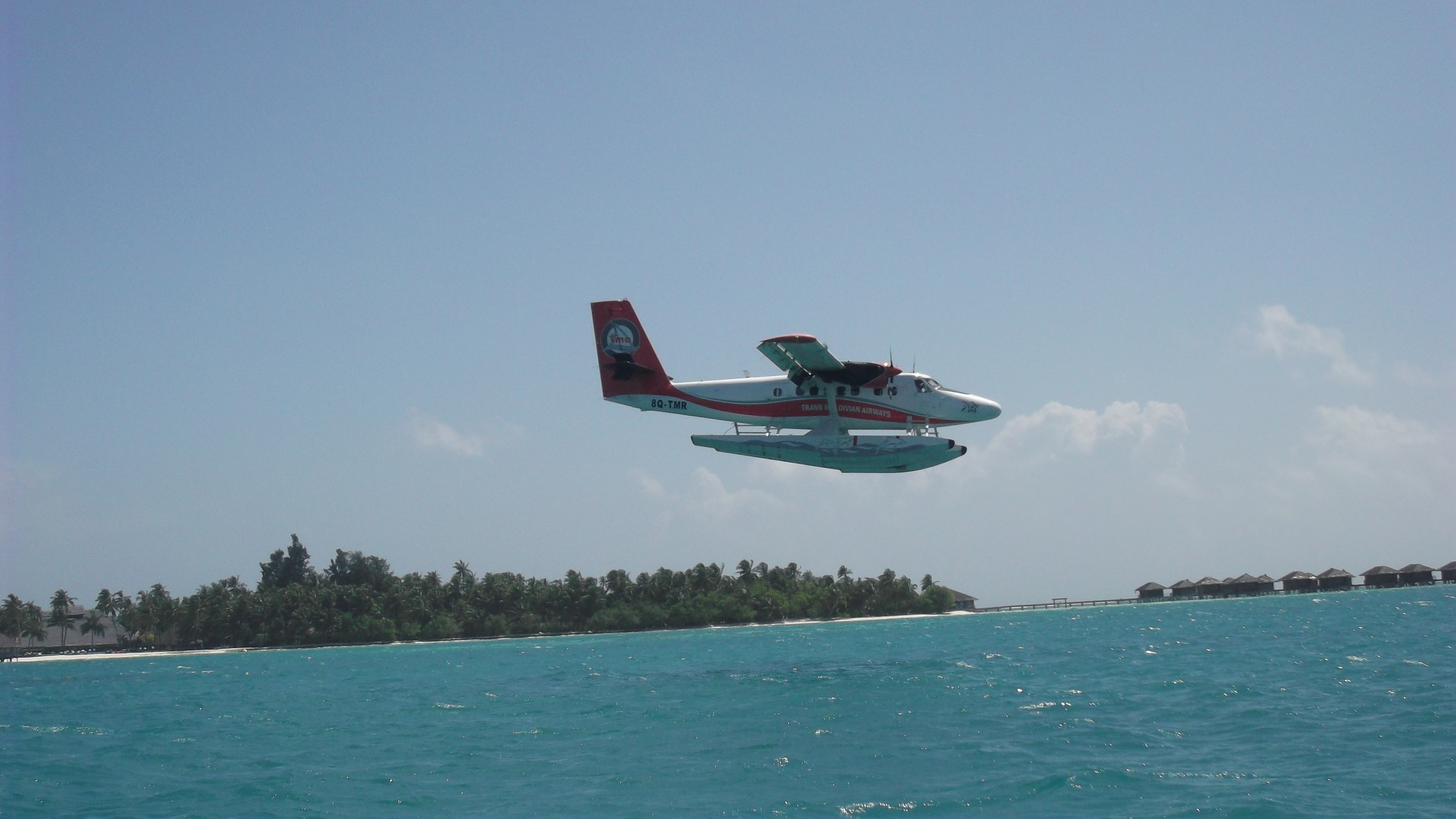 DHC-6 Мальдивы. Остров Мале аэропорт. Аэропорт Мале на обрыве. Seaplane NYC Coni ILAND.