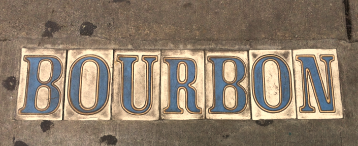 File:Bourbon Street sign in sidewalk.png