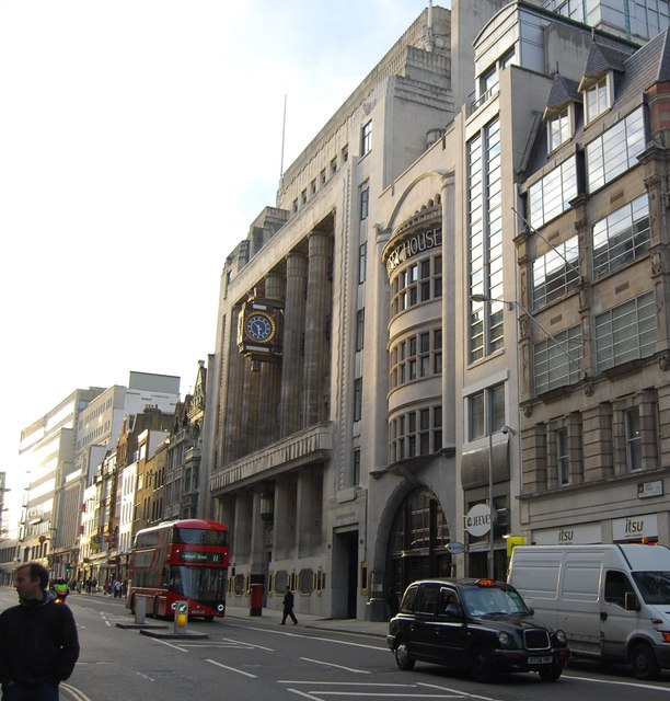 Dragon on Holborn Viaduct in the City of London with Goldman Sachs